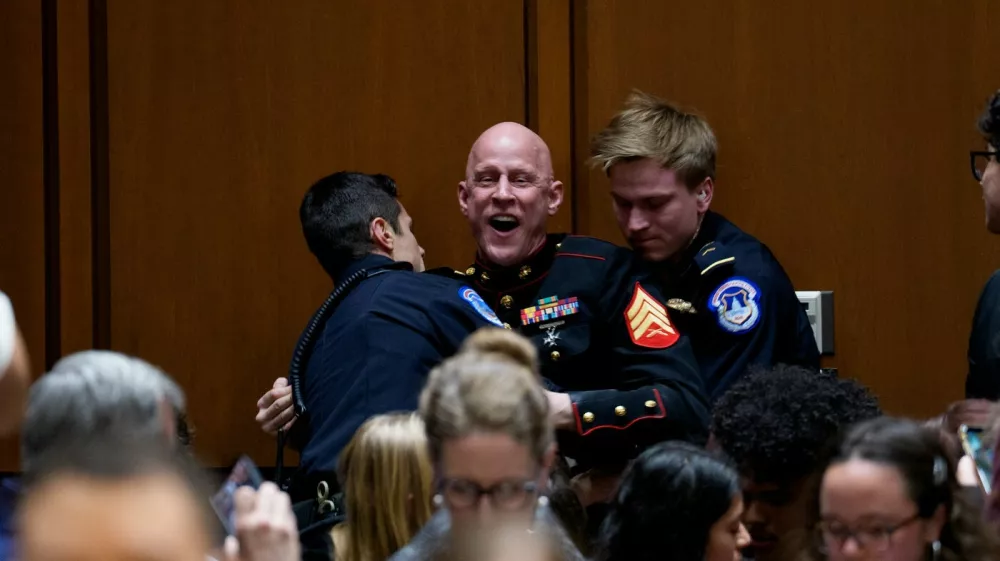WASHINGTON, DC - MARCH 4: Brian McGinnis, a protester dressed in a military uniform, disrupts a Senate Armed Services Subcommittee hearing on Capitol Hill on March 4, 2026 in Washington, DC. The protester has been identified as Brian McGinnis from North Carolina. The Subcommittee on Readiness and Management Support is holding a hearing to examine the current readiness of the Joint Force. Andrew Harnik,Image: 1080109636, License: Rights-managed, Restrictions:, Model Release: no