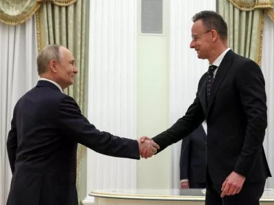 Russian President Vladimir Putin shakes hands with Hungarian Foreign Minister Peter Szijjarto during a meeting in Moscow, Russia, March 4, 2026. Sputnik/Mikhail Metzel/Pool via REUTERS ATTENTION EDITORS - THIS IMAGE WAS PROVIDED BY A THIRD PARTY.
