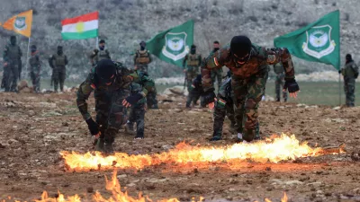 FILE PHOTO: Iranian Kurdish fighters from the Kurdistan Freedom Party (PAK) take part in a training session at a base on the outskirts of Erbil, Iraq February 12, 2026. REUTERS/Thaier Al-Sudani/File Photo