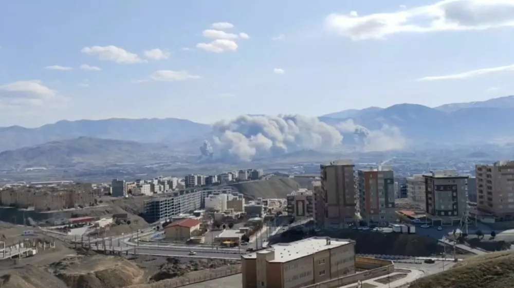 Smoke plumes of Sanandaj, Kurdistan province, Iran, amid the U.S.-Israeli conflict with Iran, in this still image taken from a social media video, released on March 5, 2026, Social media/via REUTERS THIS IMAGE HAS BEEN SUPPLIED BY A THIRD PARTY. MANDATORY CREDIT. NO RESALES. NO ARCHIVES. NEWS USE ONLY. VERIFICATION. BULLET POINTS:Road layout, buildings and terrain matched satellite imagery. Date not verified but no older version of the video were found posted online before March 5. Local media reported that explosions were heard in Sanandaj early Thursday morning.