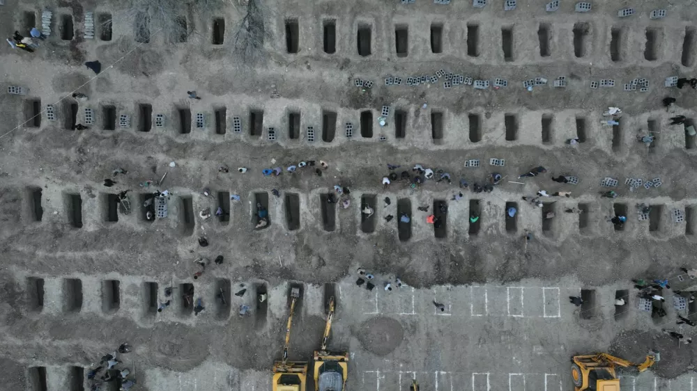 Graves are being prepared for the victims following a reported strike on a school in Minab, Iran, March 2, 2026. Iranian Foreign Media Department/WANA (West Asia News Agency)/Handout via REUTERS ATTENTION EDITORS - THIS PICTURE WAS PROVIDED BY A THIRD PARTY. REFILE &ndash; REMOVING ATTRIBUTION TO STRIKE