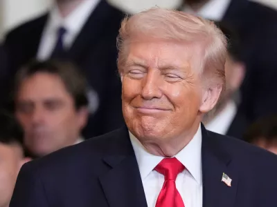 President Donald Trump smiles as he listens during an event to honor the 2025 Major League Soccer champions Inter Miami CF in the East Room of the White House, Thursday, March 5, 2026, in Washington. (AP Photo/Alex Brandon)