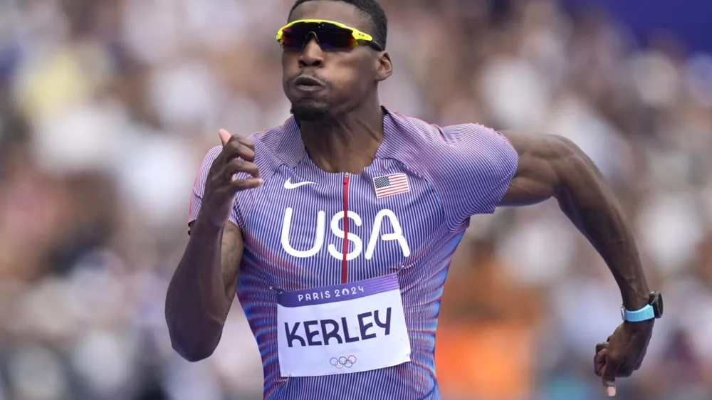 FILE - Fred Kerley, of the United States, competes in the men's 100-meter heats at the 2024 Summer Olympics, Aug. 3, 2024, in Saint-Denis, France. (AP Photo/Matthias Schrader, File)