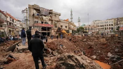 People inspect the damage where Israel's military carried out an airborne operation that dropped troops overnight, in the town of Nabi Chit, Lebanon, March 7, 2026. REUTERS/ Mohammad Yassine