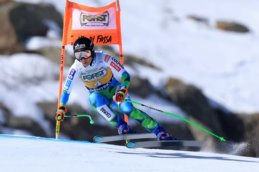 Slovenia's Ilka Stuhec speeds down the course during an alpine ski, women's World Cup downhill, in Val di Fassa, Italy, Saturday, March 7, 2026. (AP Photo/Luciano Bisi)