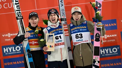 Second placed Domen Prevc, of Slovenia, from left, winner Daniel Tschofenig of Austria and third placed Ryoyu Kobayashi of Japan celebrate on the podium after the men's ski jumping Large Hill HS130 at the FIS Nordic World Cup Lahti Ski Games in Lahti,, Finland, Saturday March 7, 2026. (Emmi Korhonen/Lehtikuva via AP)