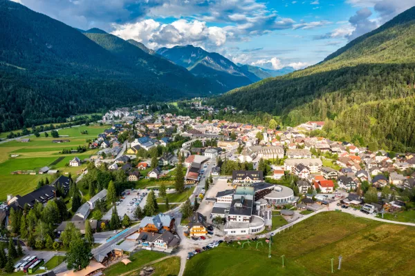Kranjska Gora town in Slovenia at summer with beautiful nature and mountains in the background. View of mountain landscape next to Kranjska Gora in Slovenia, view from the top the town Kranjska Gora.