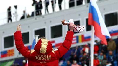 Milano Cortina 2026 Paralympics - Para Alpine Skiing - Women's Super-G Standing Victory Ceremony - Tofane Alpine Skiing Centre, Belluno, Italy - March 09, 2026. Gold medallist Varvara Voronchikhina of Russia celebrates on the podium during the women's super-g standing victory ceremony REUTERS/Lisi Niesner
