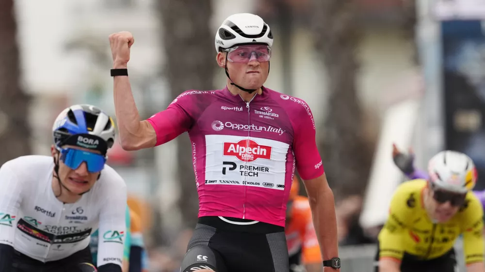 Dutch cyclist Mathieu Van Der Poel crosses the finish line to win the fourth stage of the Tirreno-Adriatico cycling race from Tagliacozzo to Martinsicuro, Italy, Thursday, March 12, 2026. (Marco Alpozzi/LaPresse via AP)