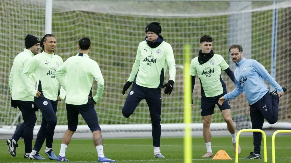 Soccer Football - UEFA Champions League - Manchester City Training - Etihad Campus, Manchester, Britain - March 10, 2026 Manchester City's Erling Haaland, Phil Foden and Nathan Ake during training Action Images via Reuters/Jason Cairnduff