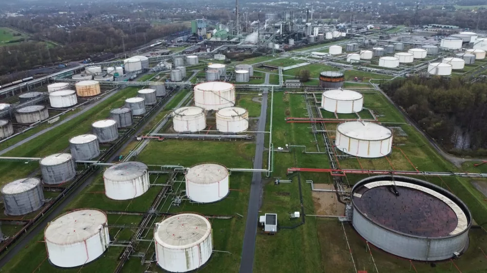 Big oil tanks are pictured in front the BP refinery in Gelsenkirchen, one of the biggest fuel producers in Germany, Wednesday, March 11, 2026. (AP Photo/Martin Meissner)