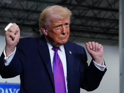 President Donald Trump dances after speaking at Verst Logistics Wednesday, March 11, 2026, in Hebron, Ky. (AP Photo/Julia Demaree Nikhinson)