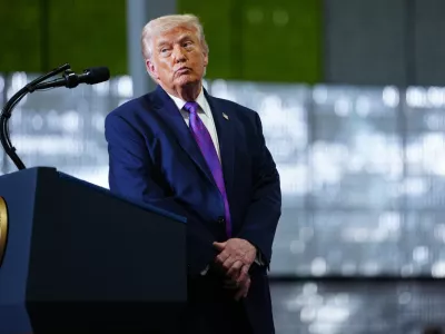 President Donald Trump pauses after a person in the crowd needed medical assistance as he speaks at Verst Logistics Wednesday, March 11, 2026, in Hebron, Ky. (AP Photo/Julia Demaree Nikhinson)