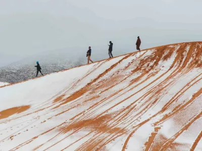 *NO UK* Snow covered sand dunes in the Sahara Desert after temperatures dropped below freezing near the town of Ain Sefra in northwestern Algeria. Photographer Karim Bouchetata captured images of the rare phenomenon in the Saharan town, known as the Gateway to the Desert, which sits around 1000 metres above sea level and is surrounded by the Atlas Mountains.Pictured: gv,general view,Image: 1082022226, License: Rights-managed, Restrictions: -GBR, Model Release: no, Pictured: gv,general view