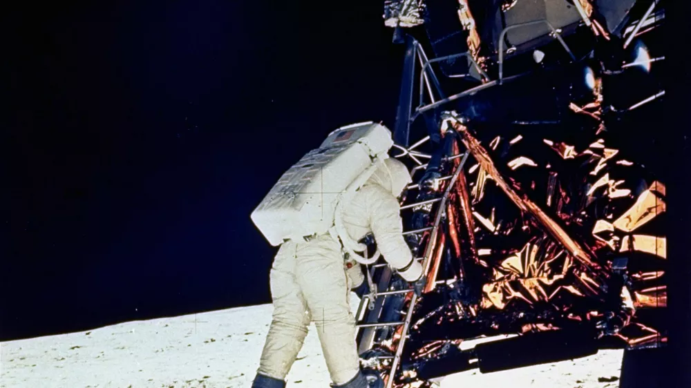FILE - In this July 20, 1969 file photo, Astronaut Edwin E. Aldrin, Jr., lunar module pilot, descends steps of Lunar Module ladder as he prepares to walk on the moon. He had just egressed the Lunar Module. (AP Photo/NASA, file)