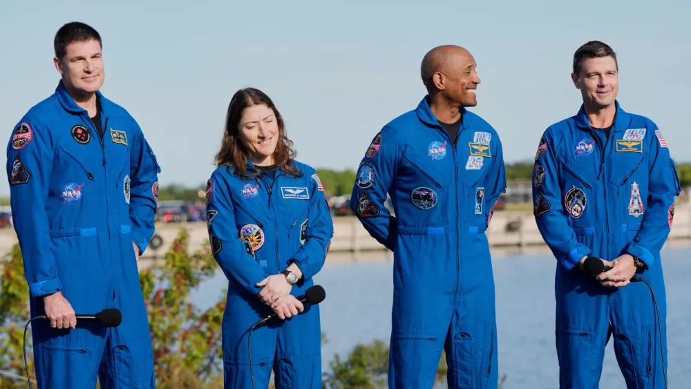 The crew of the new NASA moon rocket, Artemis II, take part in a news conference, from left, Canadian Space Agency astronaut Jeremy Hansen, mission specialist, Christina Koch, pilot Victor Glover and commander Reid Wiseman at the Kennedy Space Center, Saturday, Jan. 17, 2026, in Cape Canaveral, Fla. (AP Photo/John Raoux)