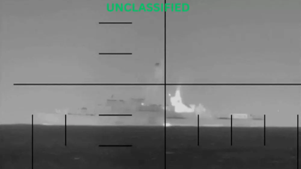 An explosion on what the U.S. Department of Defense says is an Iranian warship, at the sea, in this screengrab obtained from a handout video released on March 4, 2026. Department of Defense/Handout via REUTERS  THIS IMAGE HAS BEEN SUPPLIED BY A THIRD PARTY. TEXT OVERLAY FROM SOURCE.  VERIFICATION: -Exact time and type of warship could not be verified -However, U.S. Defense Secretary Pete Hegseth confirmed that a U.S. submarine sank an Iranian warship off the southern coast of Sri Lanka on Wednesday (March 4) -Sri Lankan Foreign Minister Vijitha Herath identified the Iranian vessel as the IRIS Dena -Deck shape and mast of the vessel seen in video matched the file imagery of the same type of warship as IRIS Dena