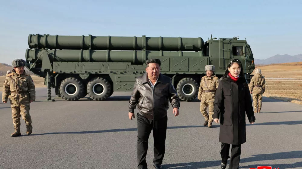North Korean leader Kim Jong Un, accompanied by his daughter Kim Ju Ae, directs a test of a large-caliber multiple-rocket launch system, in an unknown location, North Korea, January 27, 2026, in this picture released by North Korea's official Korean Central News Agency on January 28, 2026.  KCNA via REUTERS  ATTENTION EDITORS - THIS IMAGE WAS PROVIDED BY A THIRD PARTY. REUTERS IS UNABLE TO INDEPENDENTLY VERIFY THIS IMAGE. NO THIRD PARTY SALES. SOUTH KOREA OUT. NO COMMERCIAL OR EDITORIAL SALES IN SOUTH KOREA.