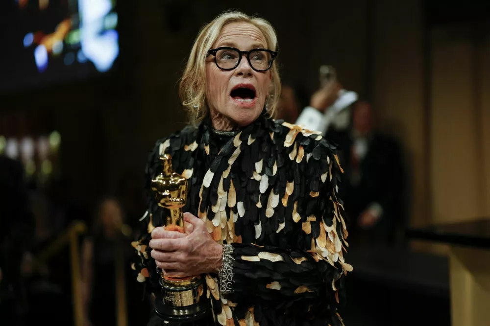 Amy Madigan, winner of the Oscar for Best Supporting Actress for "Weapons" poses at the Governors Ball following the Oscars show at the 98th Academy Awards in Hollywood, Los Angeles, California, U.S., March 15, 2026. REUTERS/Carlos Barria