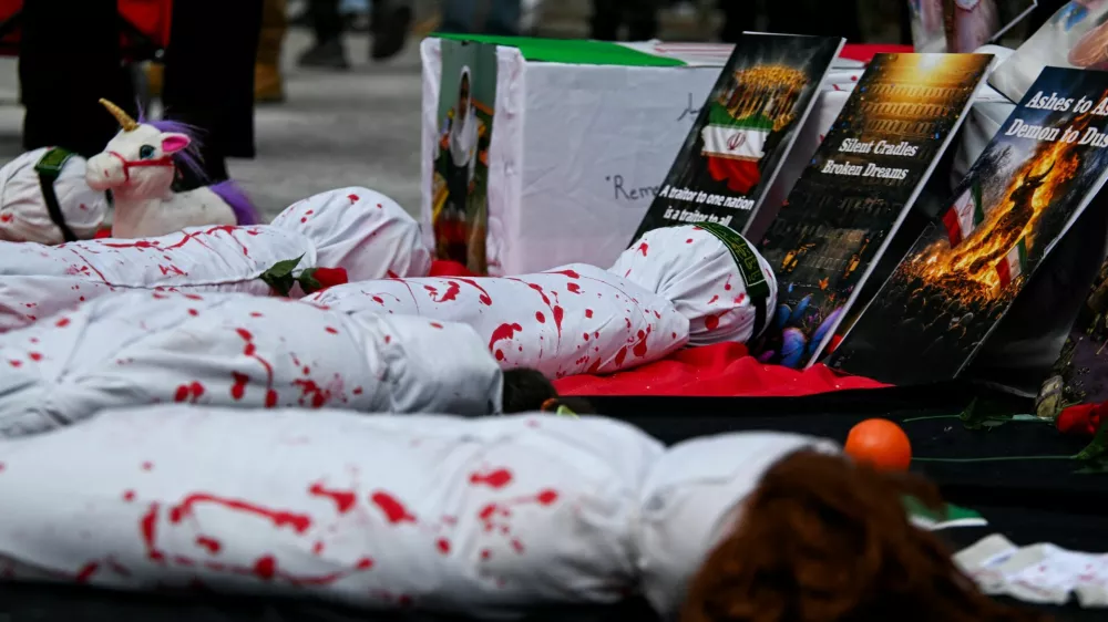A makeshift memorial for the victims of a strike on an Iranian girls' school that killed scores of children, at a protest marking Al-Quds Day and opposing the war on Iran and Lebanon outside the U.S. consulate in Toronto, Ontario, Canada, March 14, 2026. REUTERS/Laura Proctor