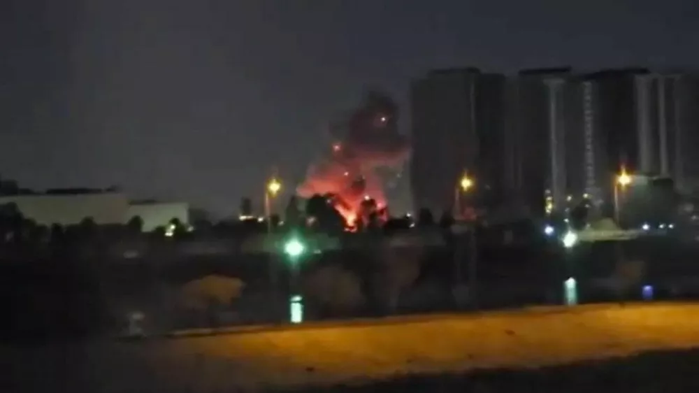 Smoke and fire rise during reported drone and rocket strikes at the U.S. embassy, according to Iraqi security sources, in Baghdad, Iraq, in this still image obtained from a social media video released on March 17, 2026. Social Media via REUTERS THIS IMAGE HAS BEEN SUPPLIED BY A THIRD PARTY. NO RESALES. NO ARCHIVES. NEWS USE ONLY. TPX IMAGES OF THE DAY    VERIFICATION: Reuters was able to confirm the location from buildings, road layout, water body, the construction crane and the pillar of the restaurant which matched file and satellite image. The strike happened within the vicinity of coordinates at 33.29897989833943, 44.38517051381258. Exact time was not verified but no older version of the video was found posted online before March 17. Security sources confirmed that drones and rockets attacked the US embassy in Baghdad on March 17.