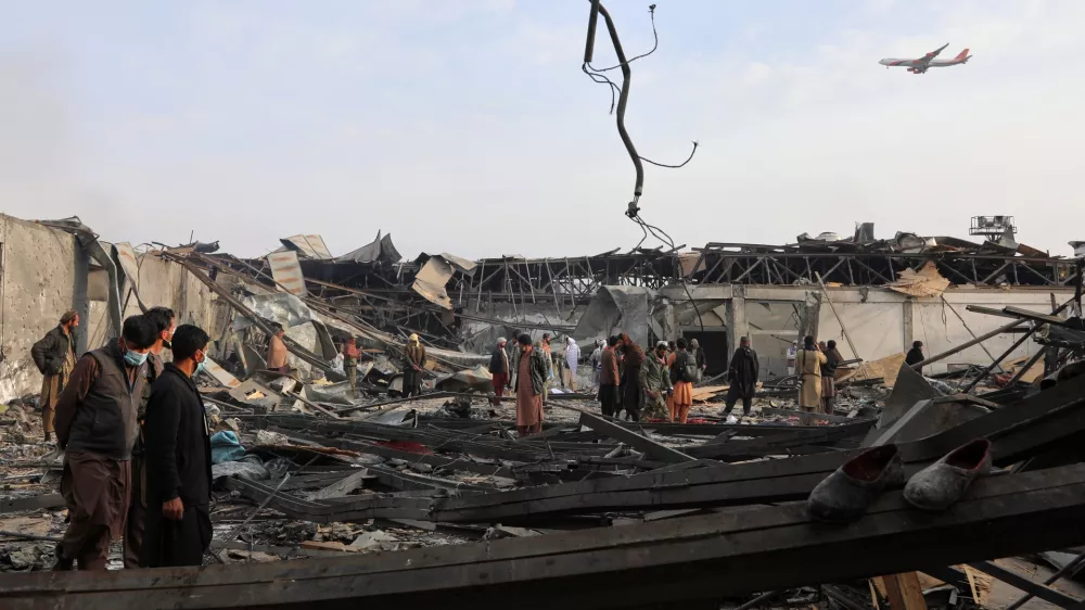 Residents and volunteers inspect the site of a late-Monday airstrike at a drug rehabilitation hospital in Kabul, Afghanistan, Tuesday, March 17, 2026. (AP Photo/Siddiqullah Alizai)