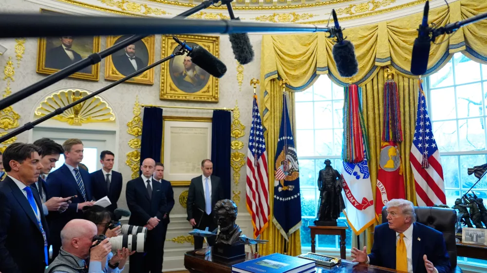 President Donald Trump speaks after signing an executive order regarding a task force on fraud in the Oval Office of the White House, Monday, March 16, 2026, in Washington. (AP Photo/Julia Demaree Nikhinson)