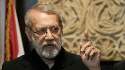 FILE -Iranian Secretary of Supreme National Security Council Ali Larijani, speaks during a press conference after his meeting with the Lebanese parliament speaker Nabih Berri, in Beirut, Lebanon, Aug. 13, 2025. (AP Photo/Bilal Hussein, File)
