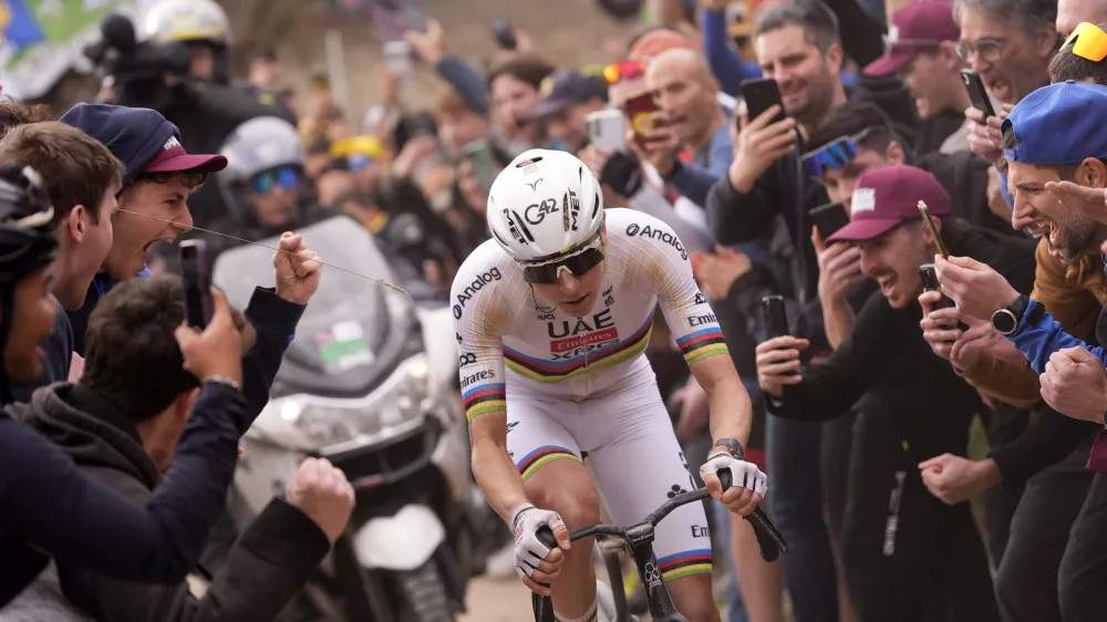 Tadej Pogacar of Team UAE Emirates pedals during the Strade Bianche (White Roads), a 203 km one day cycling race from and to Siena, Italy, Saturday March 7, 2026. (Fabio Ferrari/LaPresse via AP)