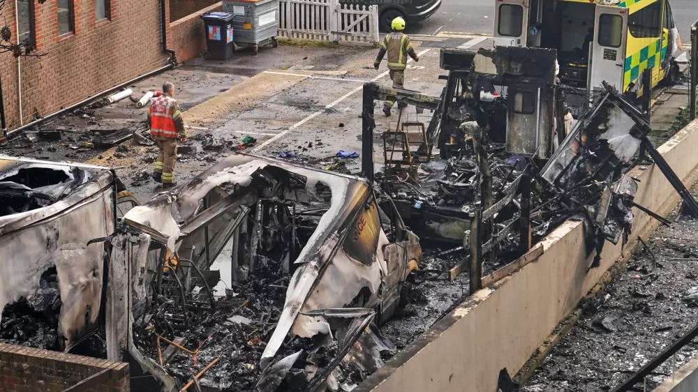 View at burnt ambulances in a car park at Golders Green in London, Monday, March 23, 2026 after an apparent arson attack on four vehicles belonging to a Jewish ambulance service, Hatzola Northwest.(AP Photo/Alberto Pezzali)