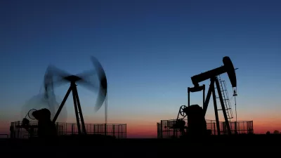 Oil pumps operate after sunset outside Vaudoy-en-Brie, near Paris, France, March 18, 2026. REUTERS/Christian Hartmann   TPX IMAGES OF THE DAY