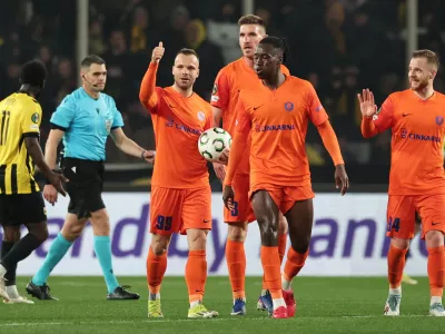 Soccer Football - UEFA Conference League - Round of 16 - Second Leg - AEK Athens v Celje - AEK Arena, Athens, Greece - March 19, 2026 Celje's Rudi Pozeg Vancas celebrates scoring their second goal with teammates REUTERS/Alkis Konstantinidis