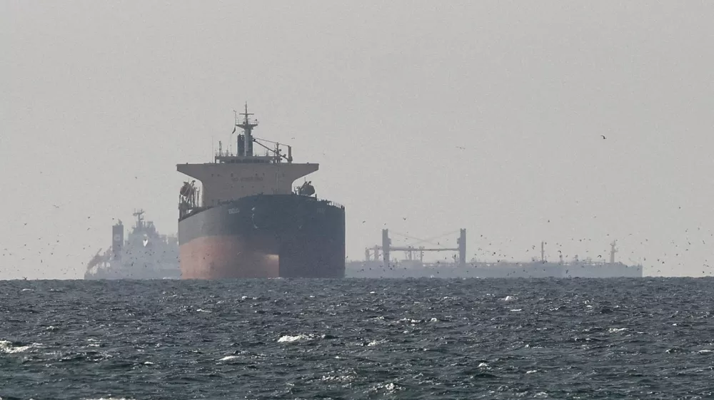 FILE PHOTO: Tankers sail in the Gulf, near the Strait of Hormuz, as seen from northern Ras al-Khaimah, near the border with Oman's Musandam governance, amid the U.S.-Israeli conflict with Iran, in United Arab Emirates, March 11, 2026. REUTERS/Stringer/File Photo