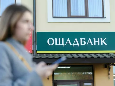 November 3, 2021, Lviv, Ukraine: Logo of Oschadbank or State Savings Bank of Ukraine is seen at one of their branches.,Image: 641461280, License: Rights-managed, Restrictions:, Model Release: no