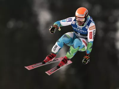 Slovenia's Miha Hrobat speeds down the course, during an alpine ski, men's downhill race, at the Lillehammer World Cup Finals, in Kvitfjell, Norway, Saturday, March 21, 2026. (AP Photo/Gabriele Facciotti)