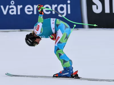Slovenia's Ilka Stuhec celebrates at the finish area of an alpine ski, women's downhill race, at the Lillehammer World Cup Finals, in Kvitfjell, Norway, Saturday, March 21, 2026. (AP Photo/Marco Trovati)