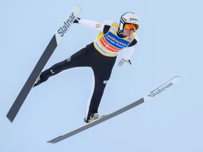 Domen Prevc from Slovenia competes in the men's large hill jump in the World Cup in Holmenkollen, outskirts of Oslo, Norway, Saturday, March 14, 2026. (Terje Pedersen/NTB Scanpix via AP)