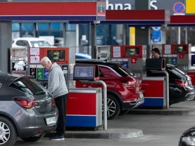 A man refills fuel in his car at a petrol station in Ljubljana, Slovenia, March 22, 2026. REUTERS/Antonio Bronic