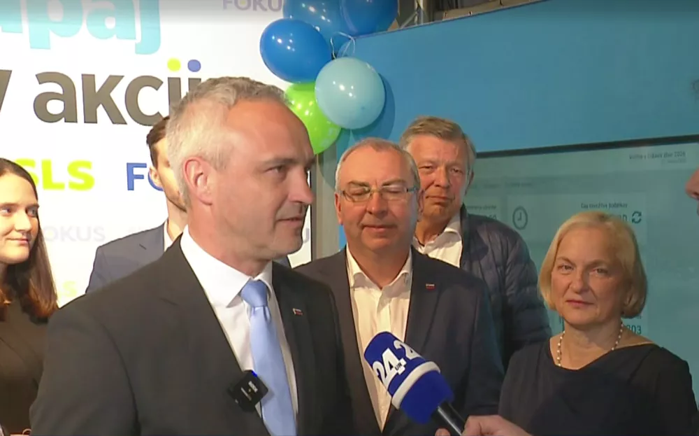 Marko Lotrič iz stranke Fokus. Je pa fotografija najbolj zgovorna. Gospodje tako, gospe drugače. / Foto: Zajem Zaslona/pop Tv