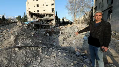 Khalil Mirzahosseini, whose brother Mahdi is missing, gestures during an interview with Reuters at the site of a destroyed building that was damaged by a strike, amid the U.S.-Israeli conflict with Iran, in Tehran, Iran, March 21, 2026. Reuters/Alaa Al-Marjani