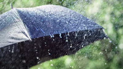 Rain on umbrella background, weather forecast and environmental concept
