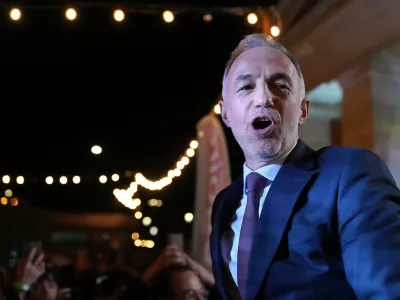 French socialist candidate for Paris mayoral election Emmanuel Gregoire celebrates after he won the second round of France's municipal elections in Paris, France, Sunday, March 22, 2026. (AP Photo/Thibault Camus)