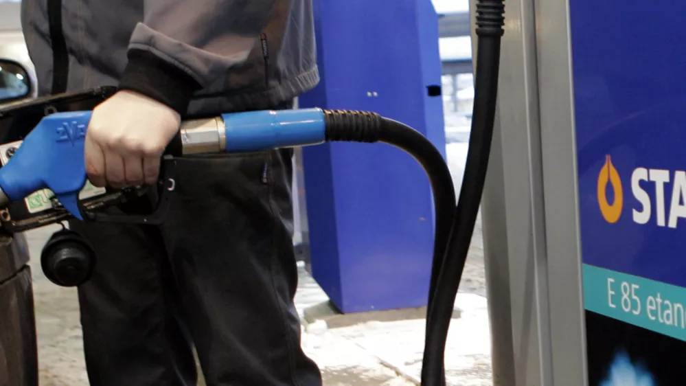 A man refuels his car with the ethanol fuel E85 at a Statoil fuel station in Stockholm, Sweden, Feb. 7, 2006. The E85 driven cars have become popular in the Swedish capital Stockholm after the introduction of congestion charges. An E85 car can run both on the ethanol fuel E85 and on regular gas. About one-quarter of the energy consumed in Sweden in 2003 came from renewable sources _ more than four times as much as the European Union average of 6 percent, according to EU statistics. (AP Photo/Maja Suslin Scanpix) ** SWEDEN OUT **