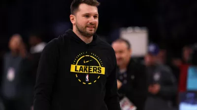 Jan 13, 2026; Los Angeles, California, USA; Los Angeles Lakers guard Luka Doncic (77) warms up before the game against the Atlanta Hawks at Crypto.com Arena. Mandatory Credit: Kiyoshi Mio-Imagn Images