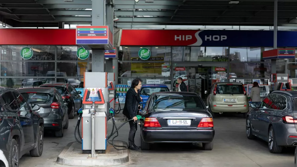 A man refills fuel in his car at a petrol station in Ljubljana, Slovenia, March 22, 2026. REUTERS/Antonio Bronic
