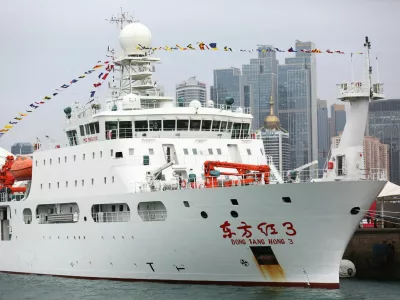 Dong Fang Hong 3, a deep-sea research vessel, docks at a pier as she joins the Ocean University of China's fleet of Dong Fang Hong scientific research vessels, in Qingdao, Shandong province, China October 25, 2019. cnsphoto via REUTERS ATTENTION EDITORS - THIS IMAGE WAS PROVIDED BY A THIRD PARTY. CHINA OUT./File Photo     To Match CHINA-MILITARY/OCEAN-MAPPING