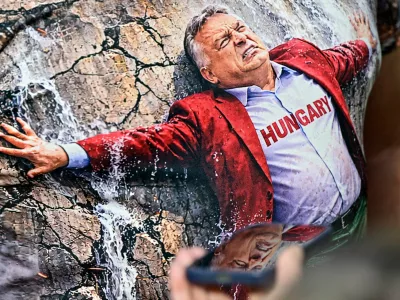 A person wears a t-shirt depicting Hungarian Prime Minister Viktor Orban, during the first so-called "Patriots' Grand Assembly" of nationalist groups from Europe, in Budapest, Hungary, March 23, 2026. REUTERS/Marton Monus