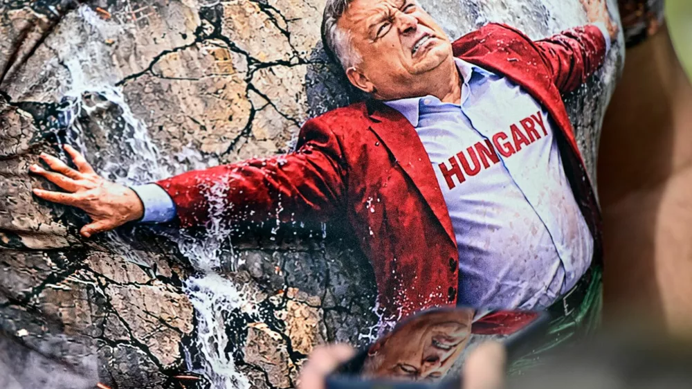 A person wears a t-shirt depicting Hungarian Prime Minister Viktor Orban, during the first so-called "Patriots' Grand Assembly" of nationalist groups from Europe, in Budapest, Hungary, March 23, 2026. REUTERS/Marton Monus