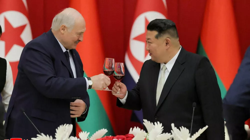 Belarusian President Alexander Lukashenko and North Korea's Kim Jong Un, attend a banquet for Lukashenko in Pyongyang, North Korea, in this picture released by North Korea's official Korean Central News Agency on March 27, 2026. KCNA via REUTERS  ATTENTION EDITORS - THIS IMAGE WAS PROVIDED BY A THIRD PARTY. REUTERS IS UNABLE TO INDEPENDENTLY VERIFY THIS IMAGE. NO THIRD PARTY SALES. SOUTH KOREA OUT. NO COMMERCIAL OR EDITORIAL SALES IN SOUTH KOREA.   TPX IMAGES OF THE DAY