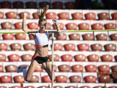 Tina Sutej of Slovenia competes in the women's pole vault during the Weltklasse IAAF Diamond League international athletics meeting at the Letzigrund stadium in Zurich, Switzerland, Thursday, Sept. 9, 2021. (Jean-Christophe Bott/Keystone via AP)
